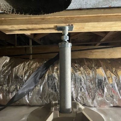 steel support post installed under a floor beam during crawlspace repair in Elizabethtown NC